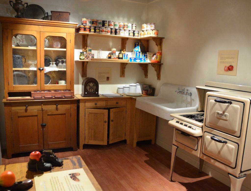 A recreated kitchen centers the story of Italian immigrants. 