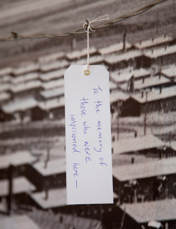 At the entry to the museum, visitors get a ticket in the form of a tag--like those that detainees were forced to wear. At the end of their visit, people can leave the tag on a display along with a message. 