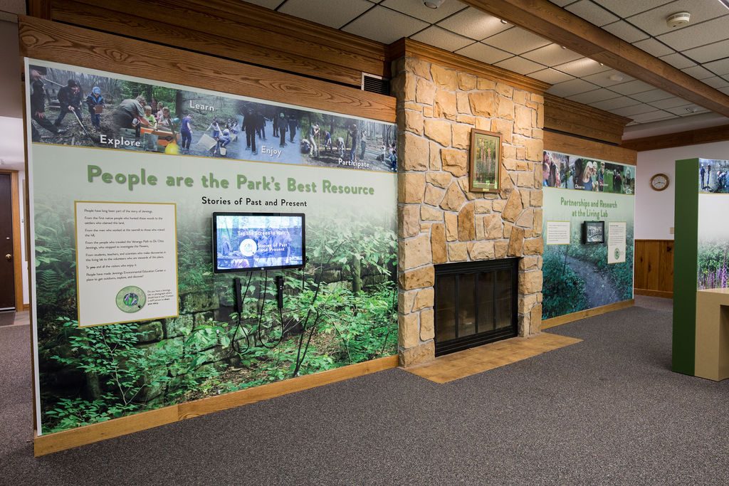 Two semi-circular displays pull out from the wall when the education room is not in use. When the park holds programs or classrooms in the space the displays can be moved back to the wall.